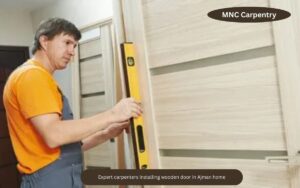 expert-carpenters-installing-wooden-door-in-ajman-home