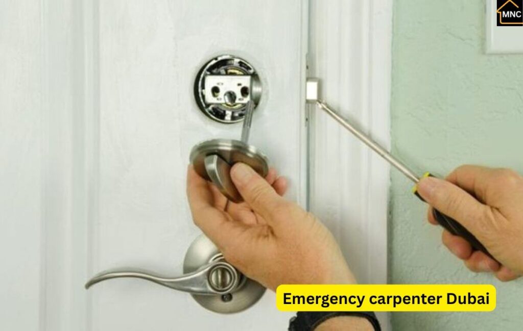 Emergency lock replacement Dubai 24/7 carpenter installing new door lock
