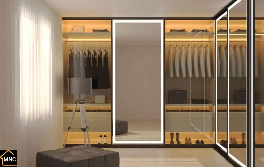 Luxury walk-in wardrobe with LED lighting and mirrored doors